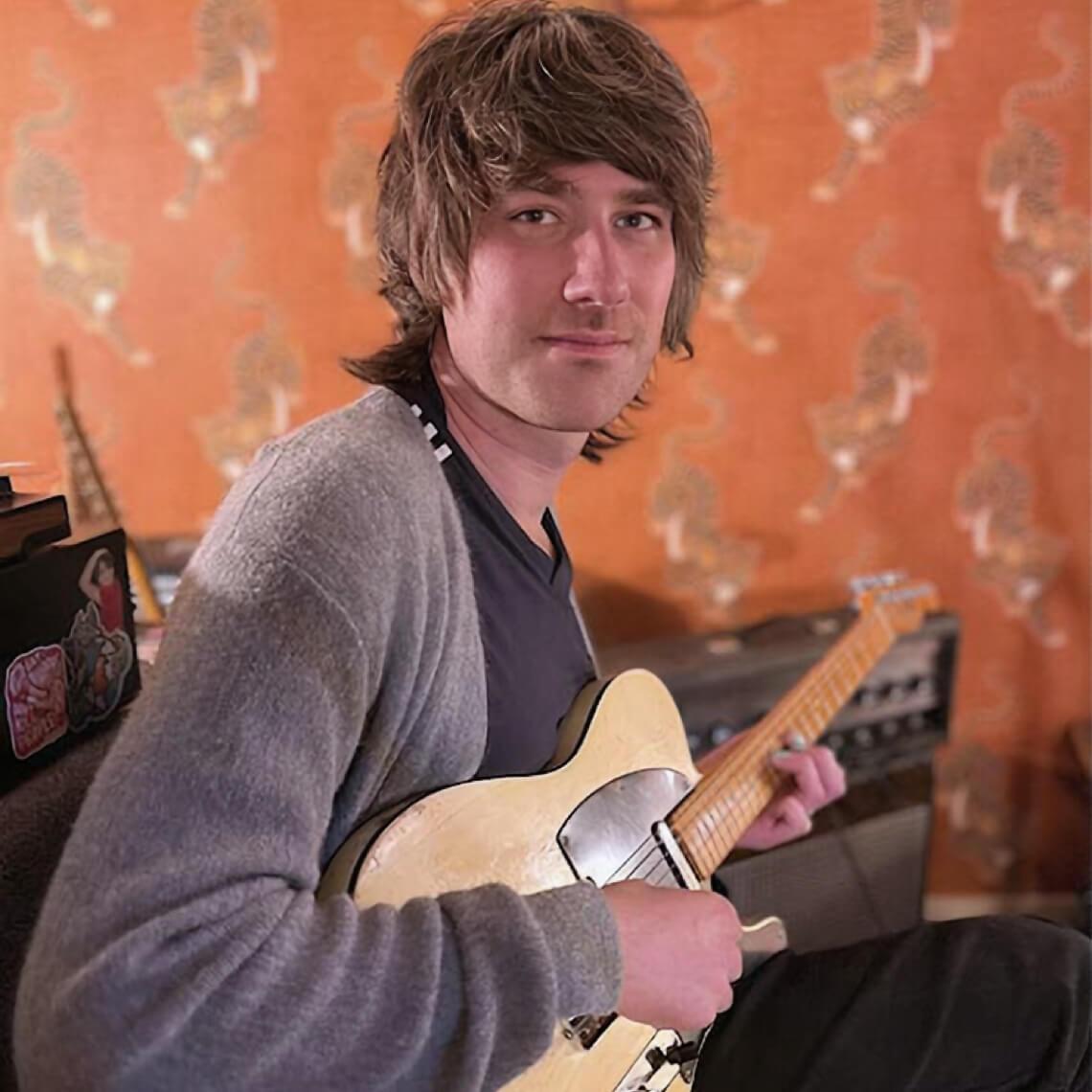 Ryan Devlin playing a Fender Telecaster guitar