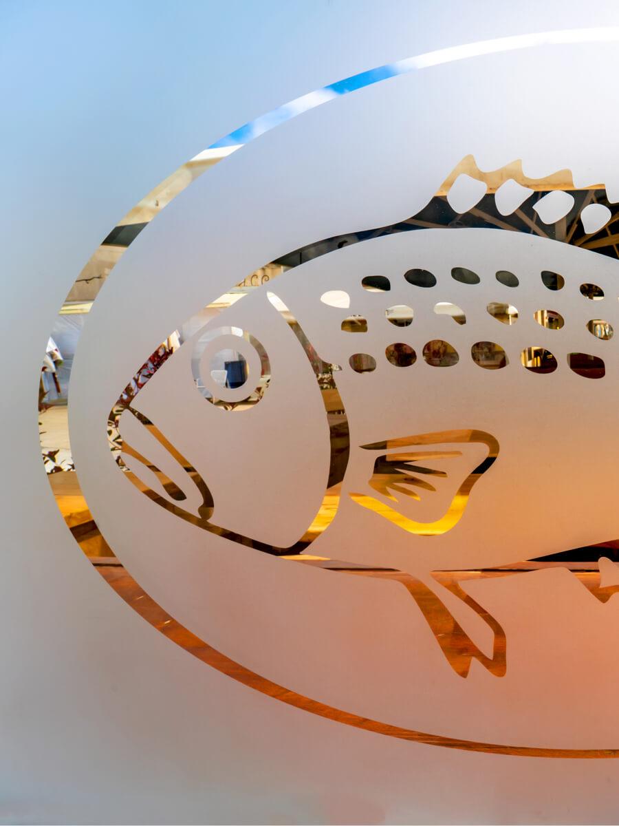 Image of a fish sandblasted on glass