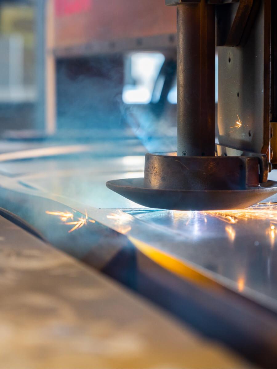 Laser cutting machine with sparks flying