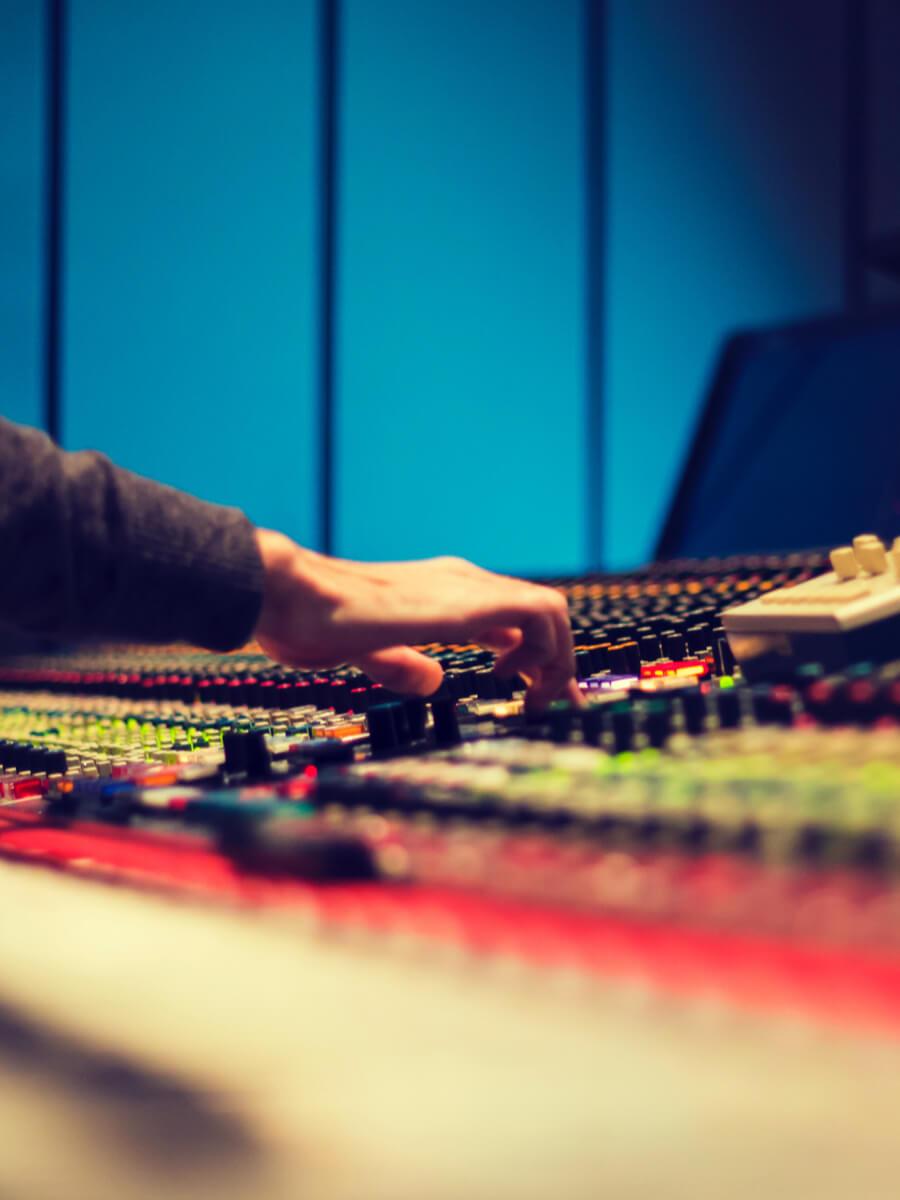 Person working at a mixing board