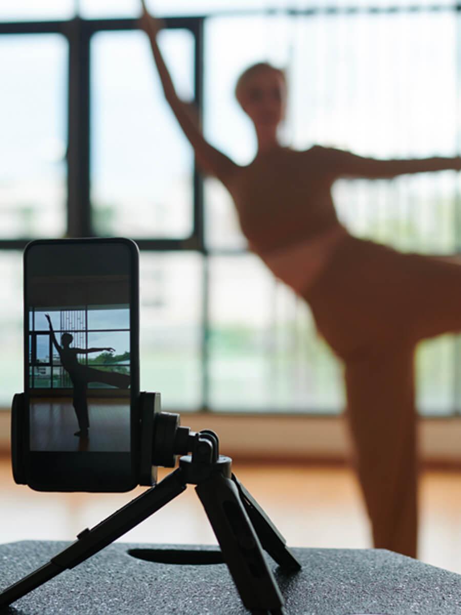 dancer dancing for cellphone video 