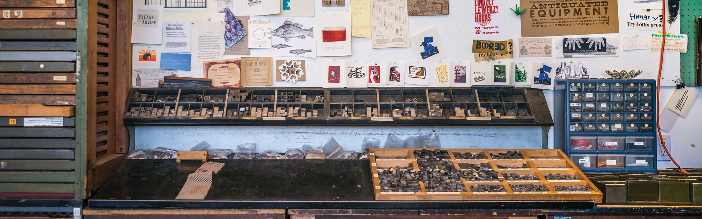 printmaking studio with block letters for printing press