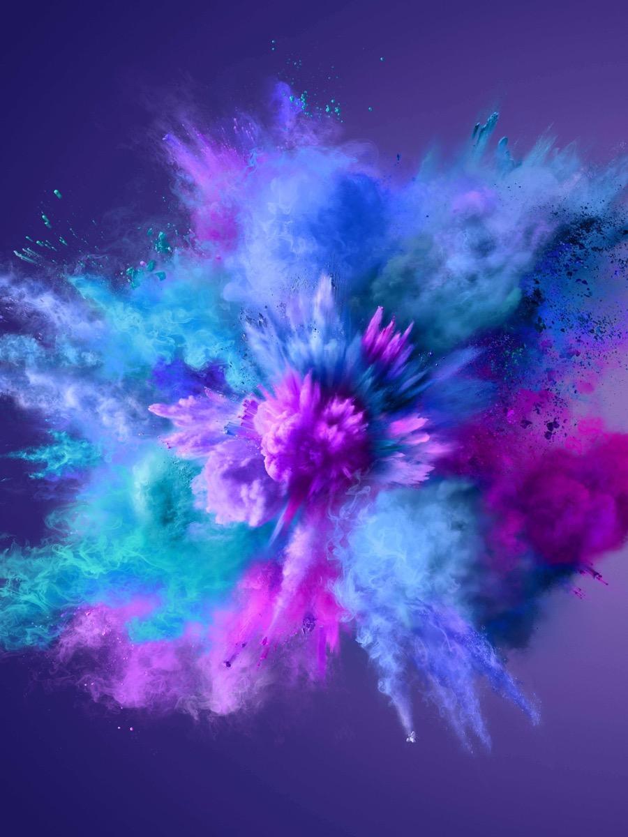Digital design purple blue pink motion graphic dust explosion with purple background. 