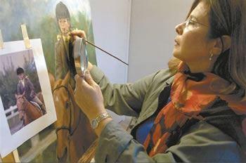 woman painting a portrait